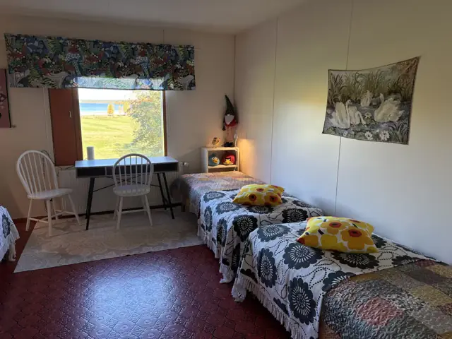 Bedroom with three single beds